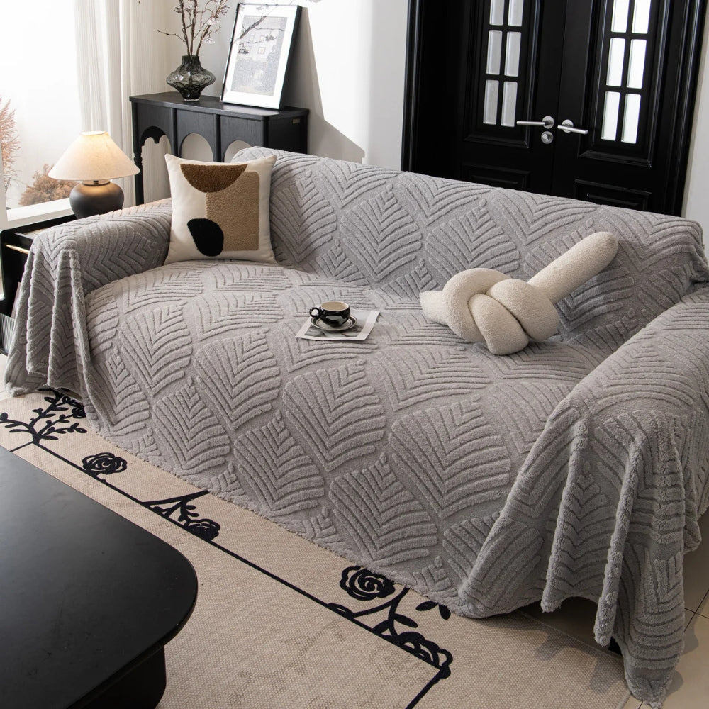 Housse de canapé en polaire motif feuilles chevrons