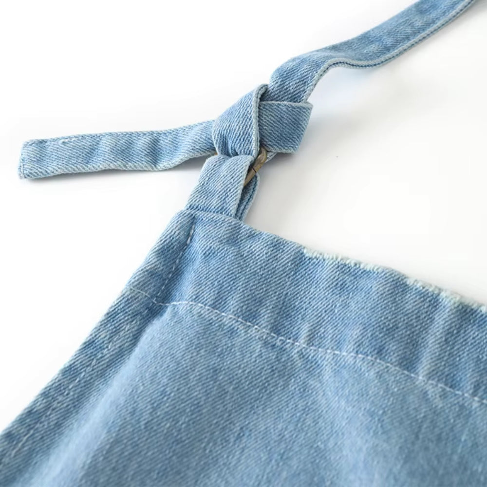 Tablier classique en denim bleu à poche
