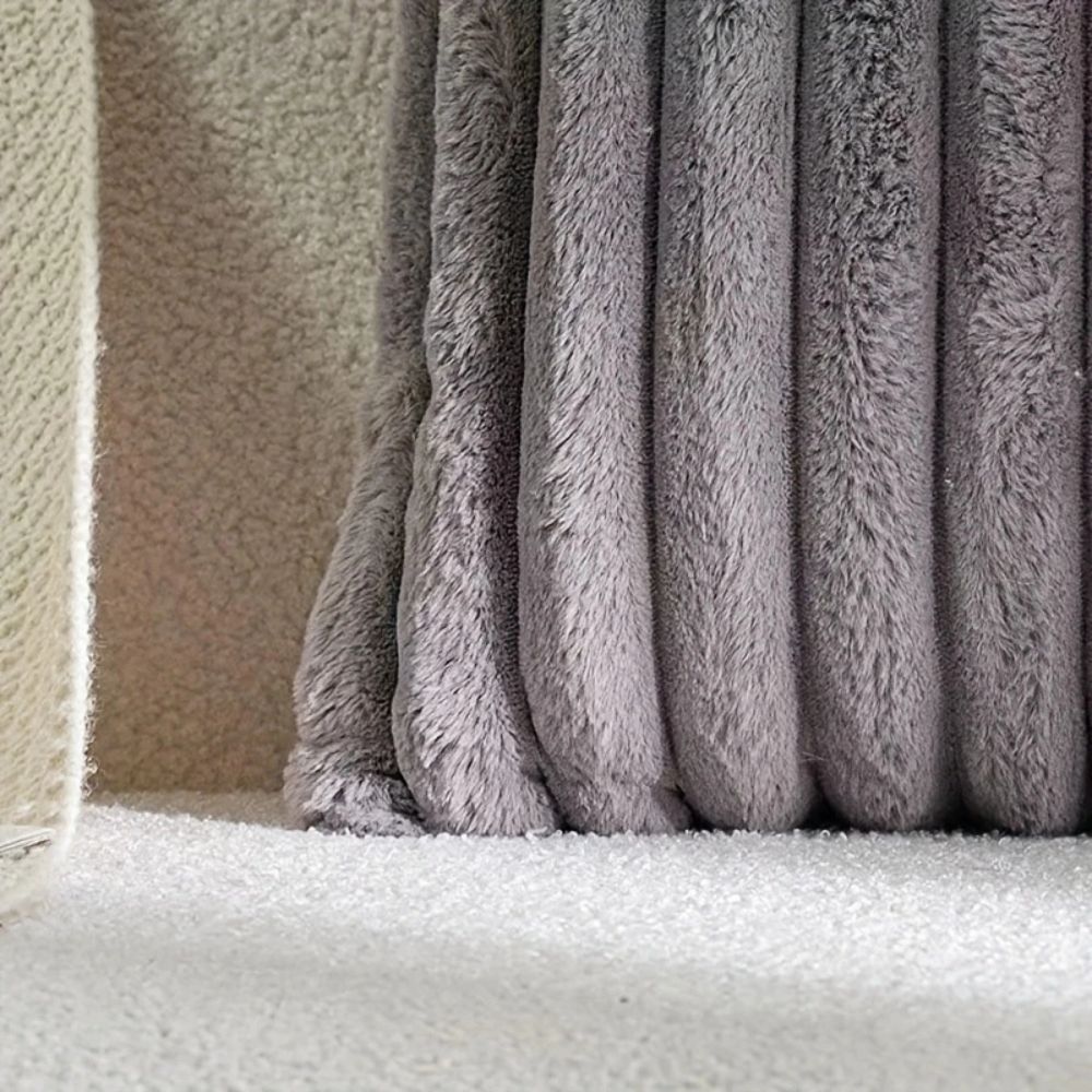 Housse de coussin en fausse fourrure Nouvia