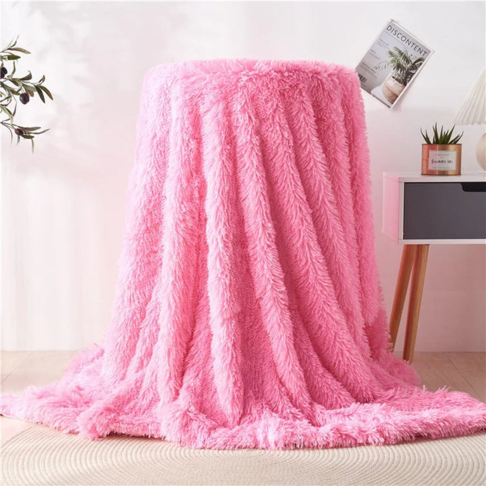 Plaid en fausse fourrure duveteuse