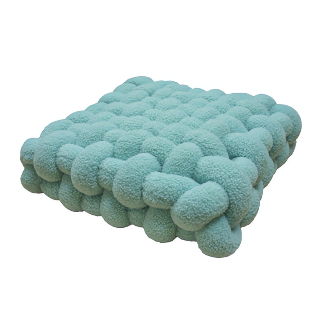 Coussin bouclette noué moelleux