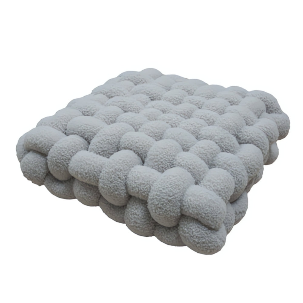Coussin bouclette noué moelleux