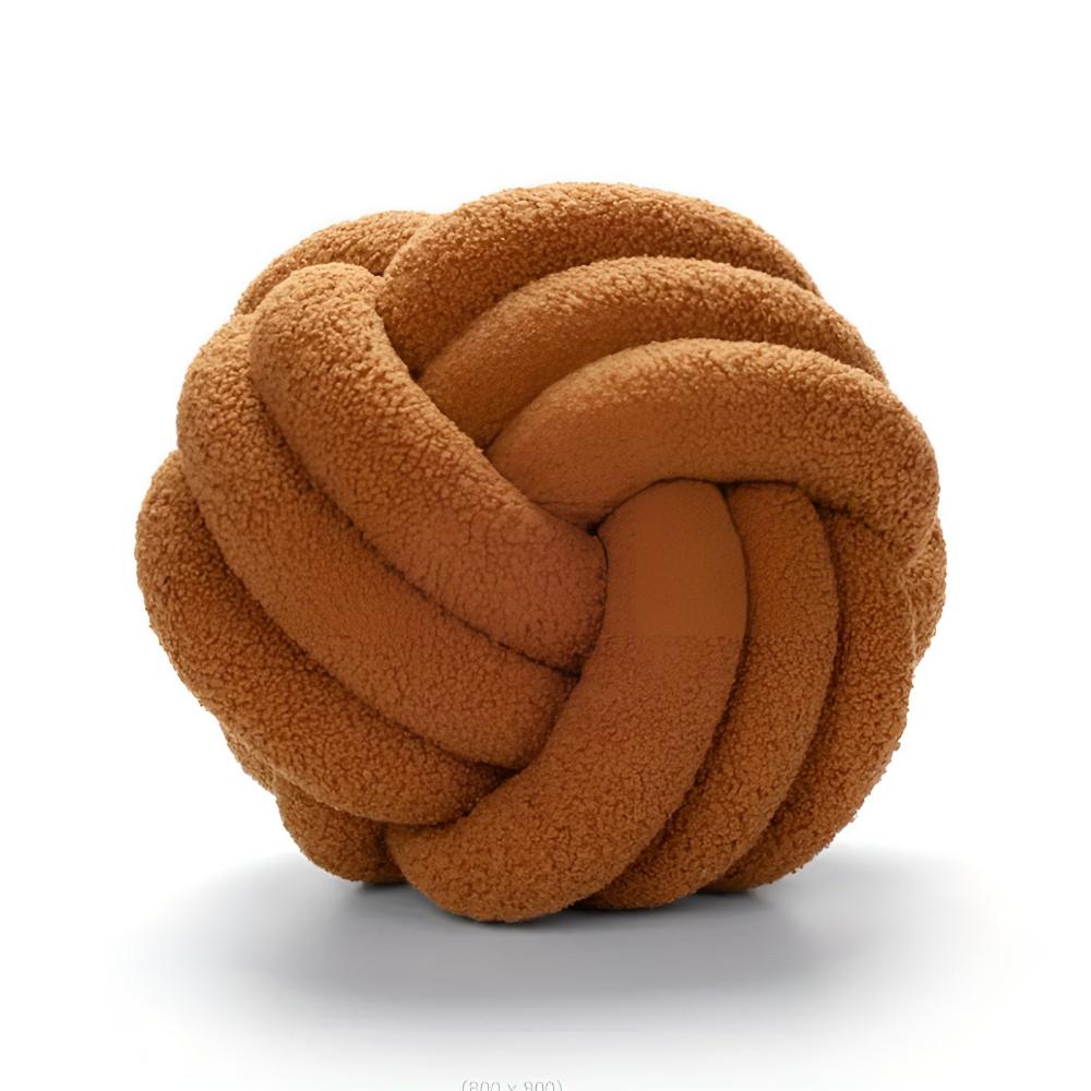 Coussin bouclette noué