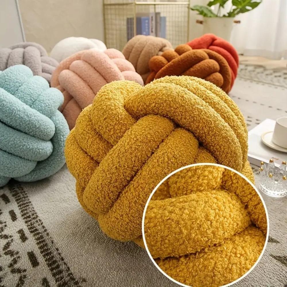 Coussin bouclette noué