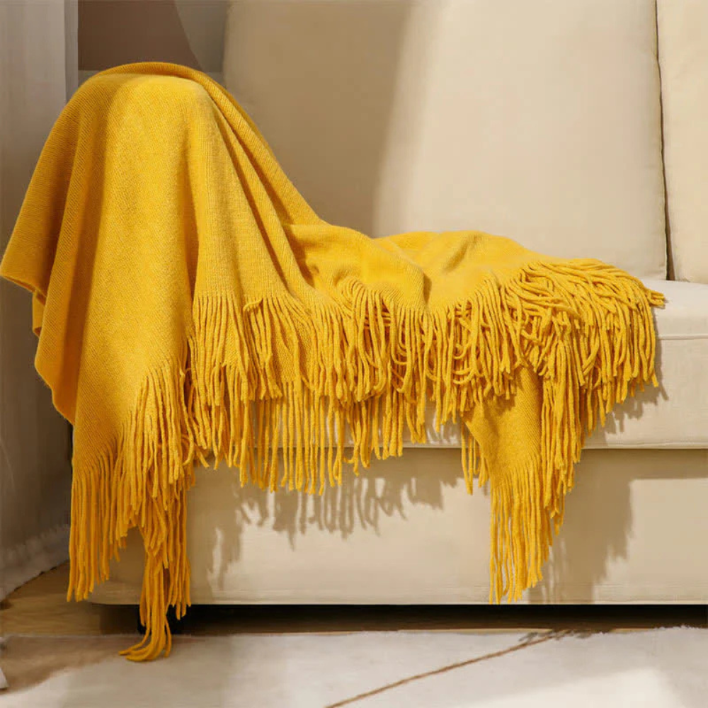 Plaid en grosse maille à pompons – Jaune