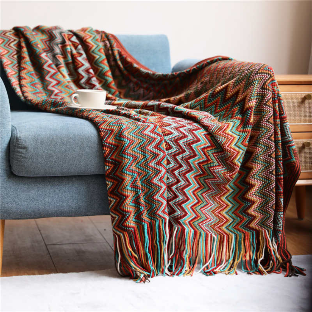 Plaid tricoté à pompons zigzag multicolore