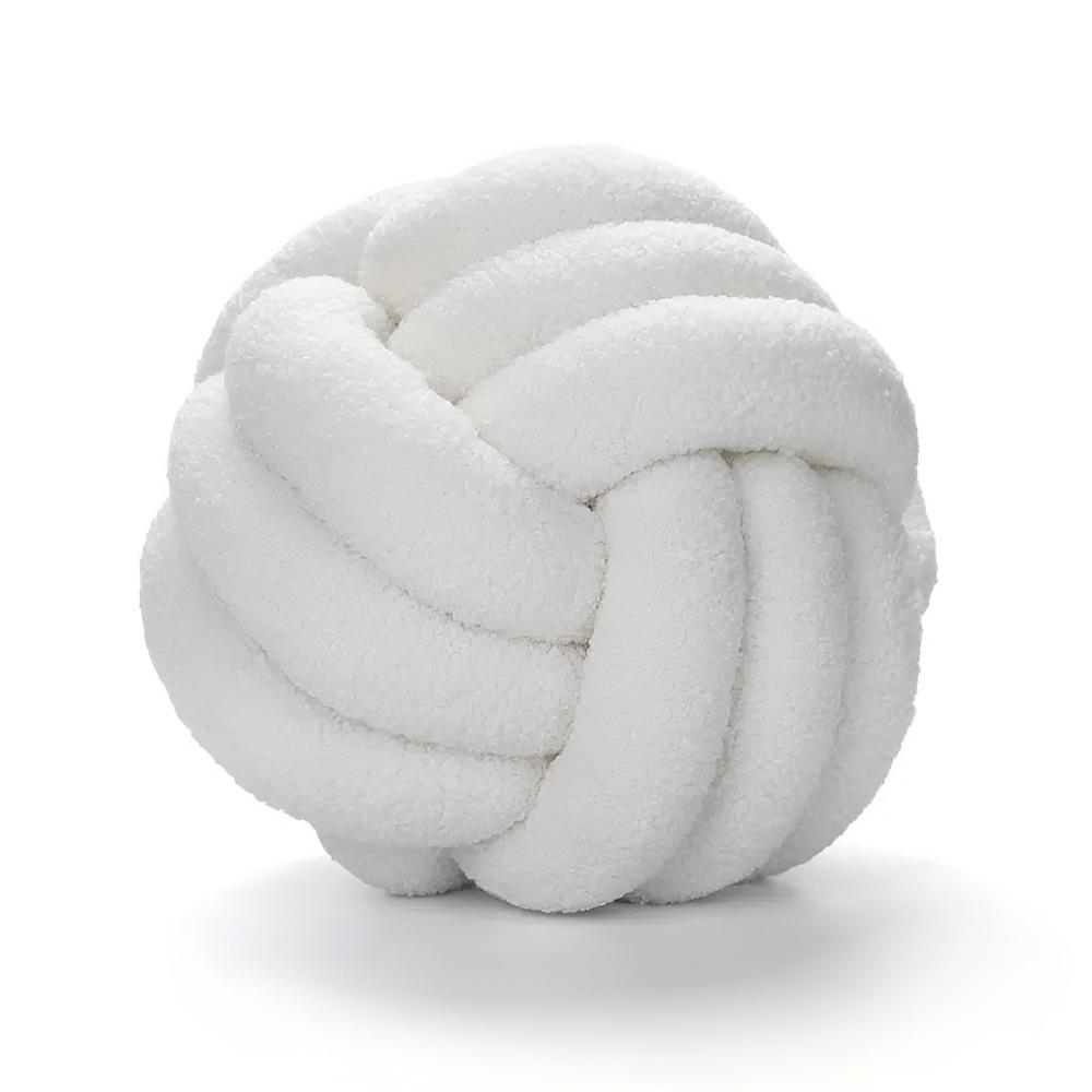 Coussin bouclette noué