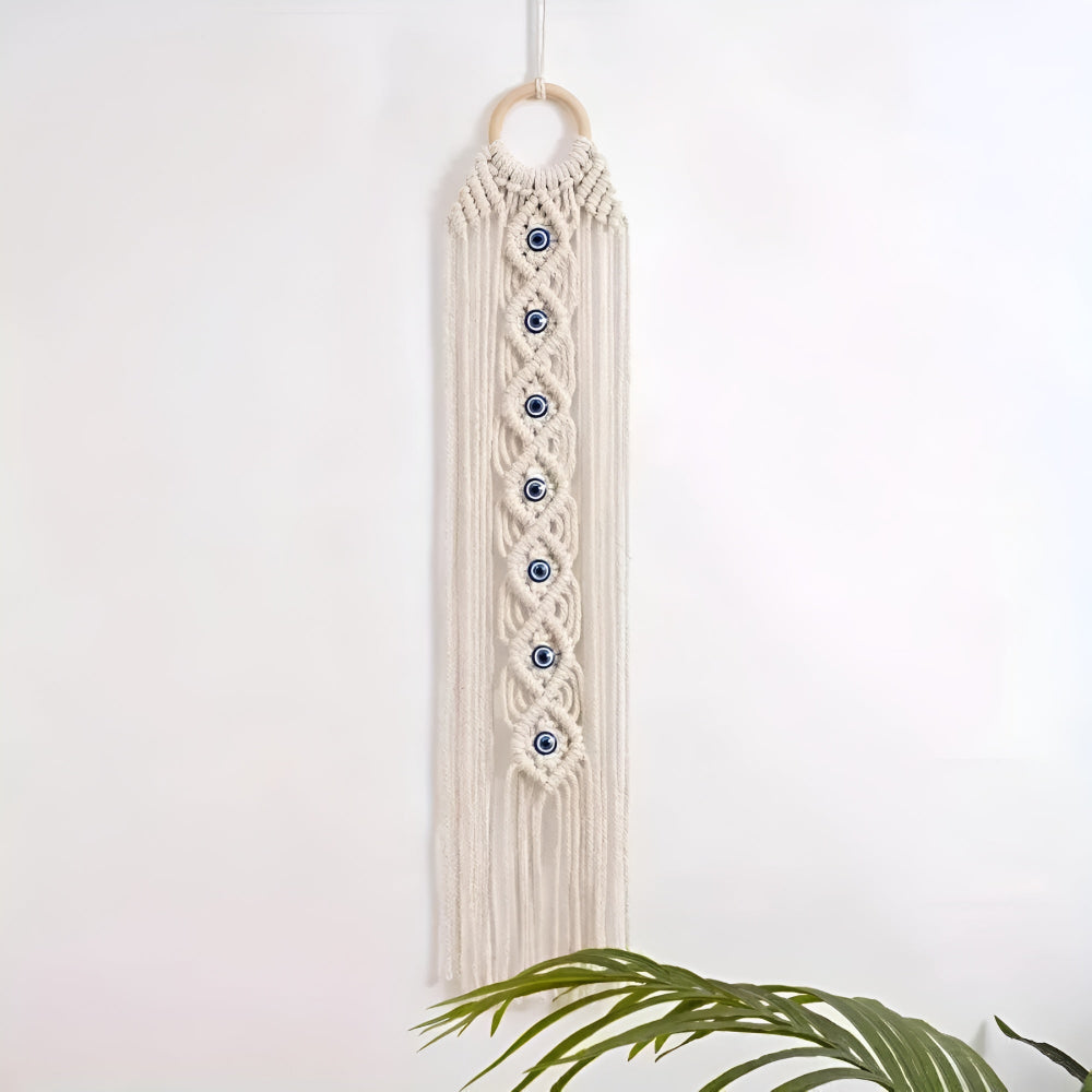 Décoration murale en macramé perles œil bohème