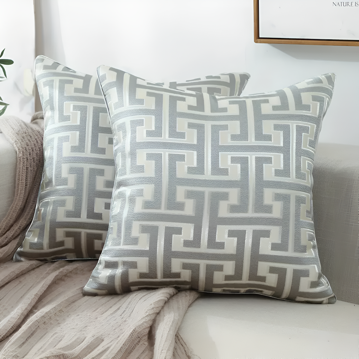 Housse de coussin jacquard géométrique