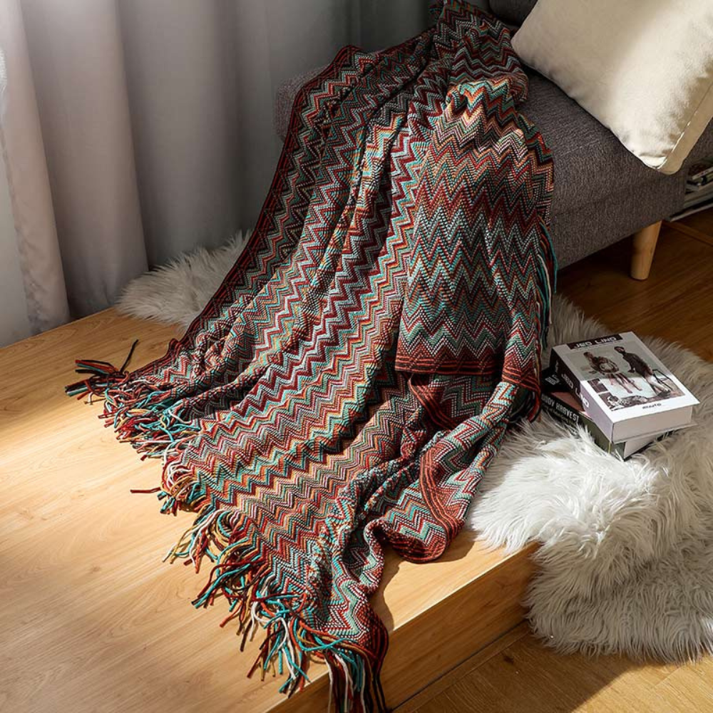 Plaid tricoté à pompons zigzag multicolore