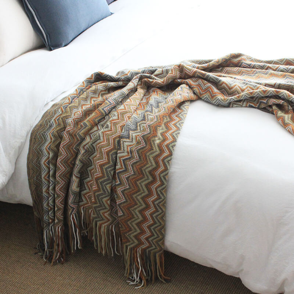 Plaid tricoté à pompons zigzag multicolore