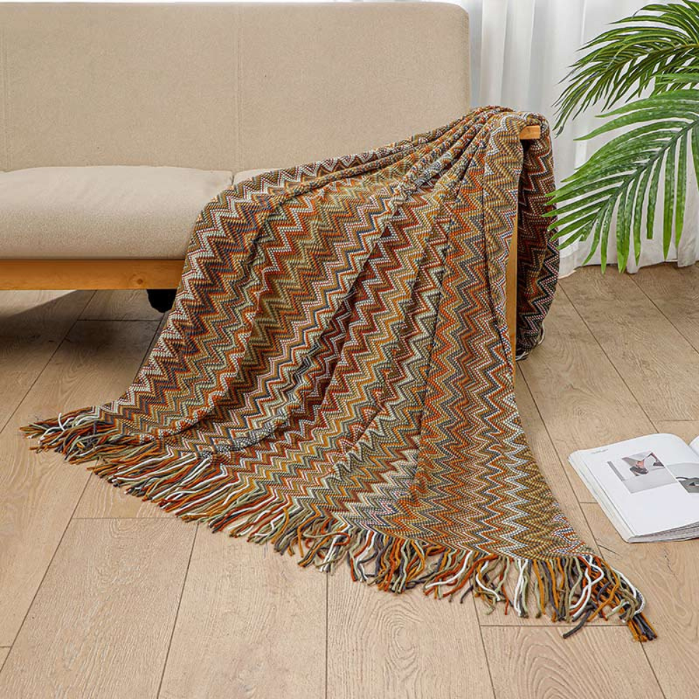 Plaid tricoté à pompons zigzag multicolore