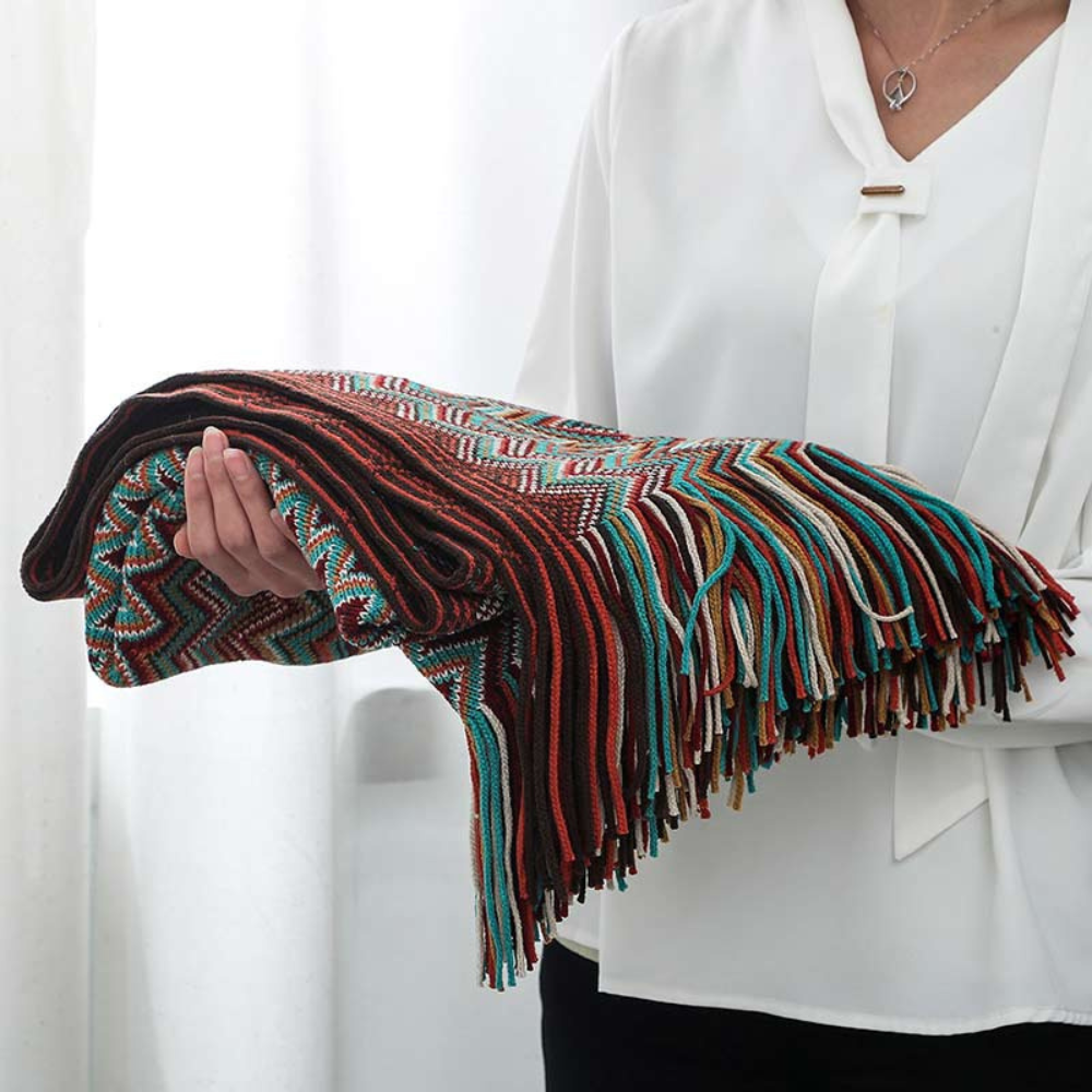 Plaid tricoté à pompons zigzag multicolore