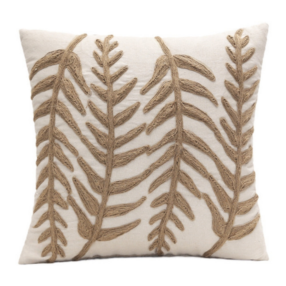 Housse de coussin brodée feuilles