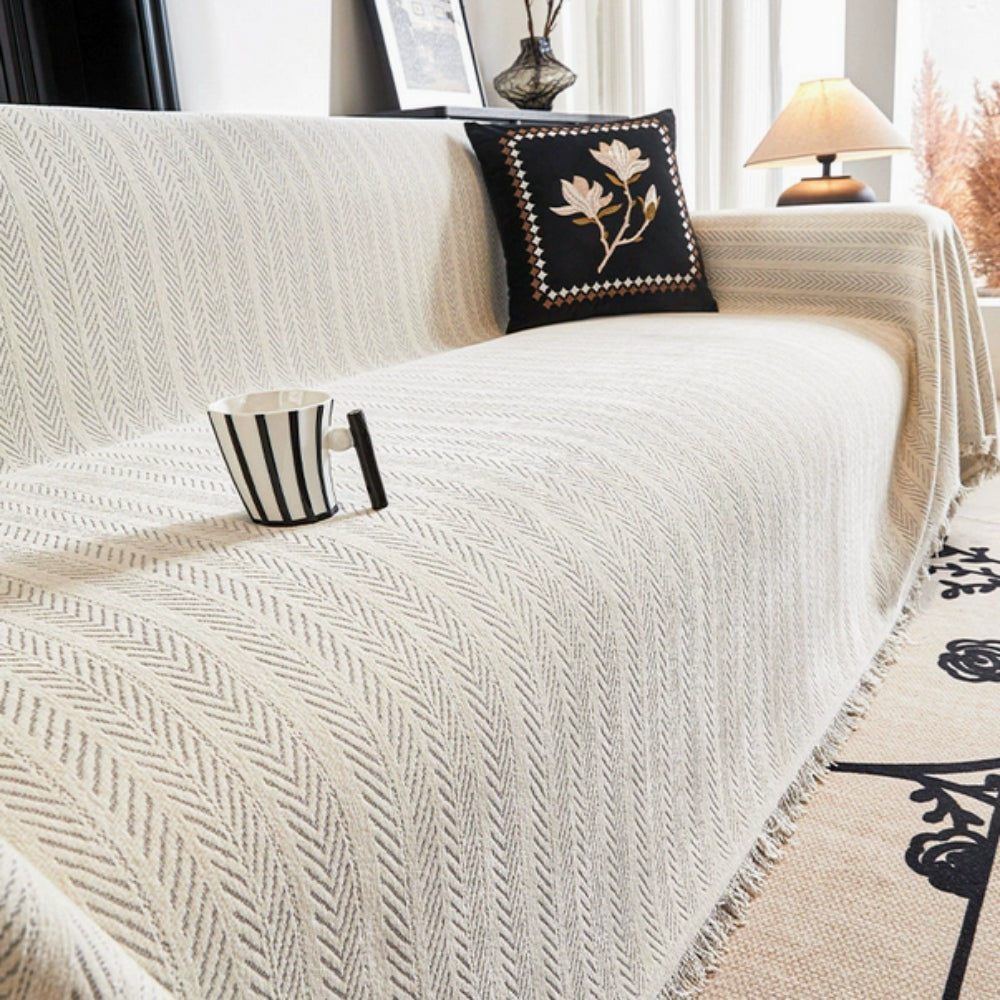 Housse de canapé en chenille à pompons chevrons