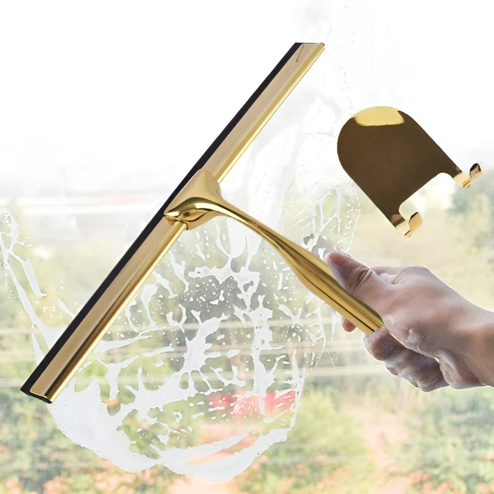 Raclette multi-usage dorée en inox
