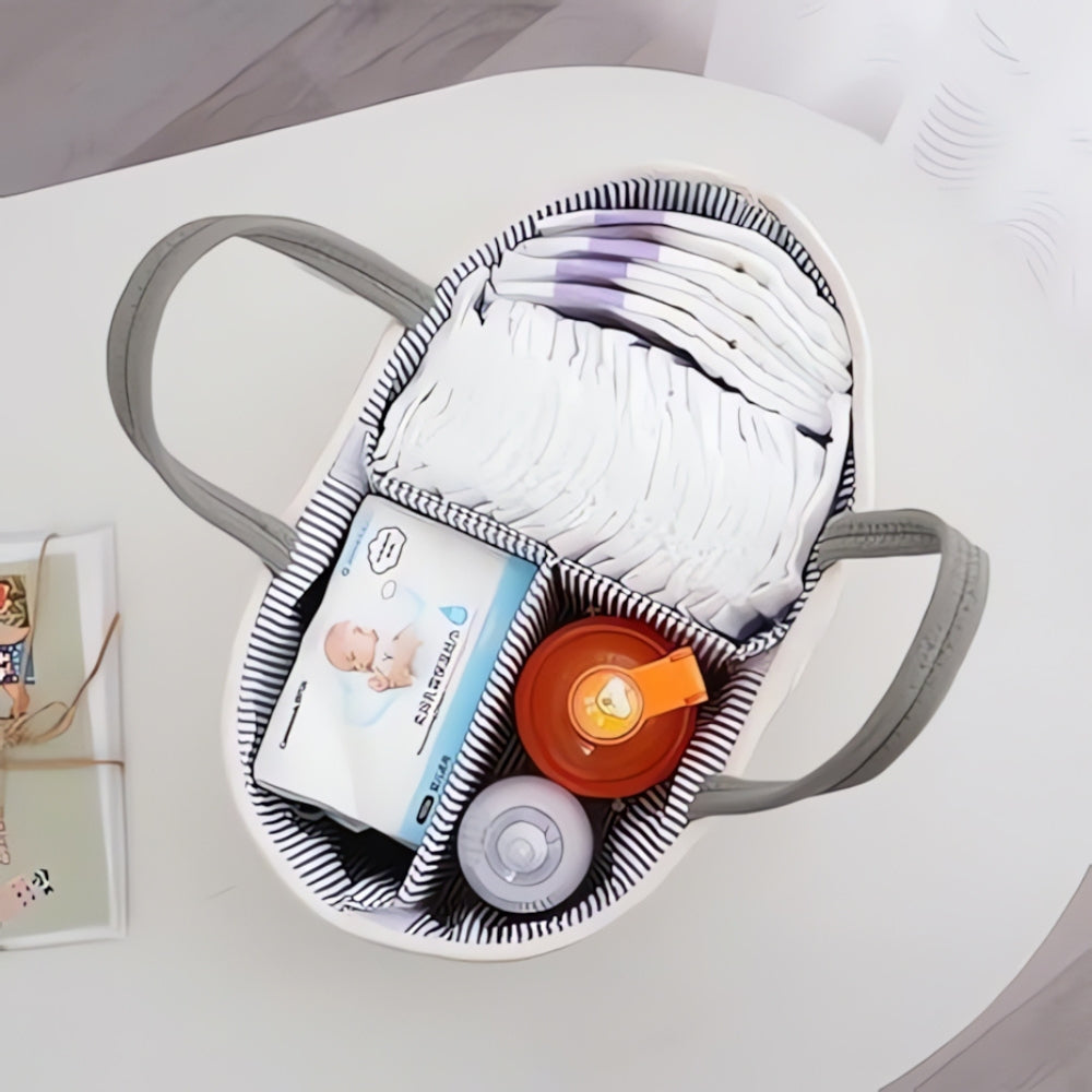 Panier tressé gris pour affaires de bébé