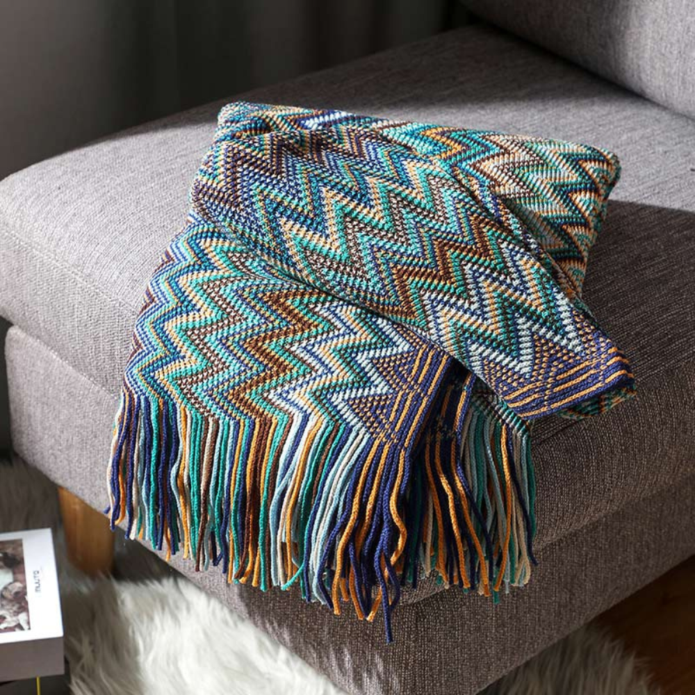 Plaid tricoté à pompons zigzag multicolore