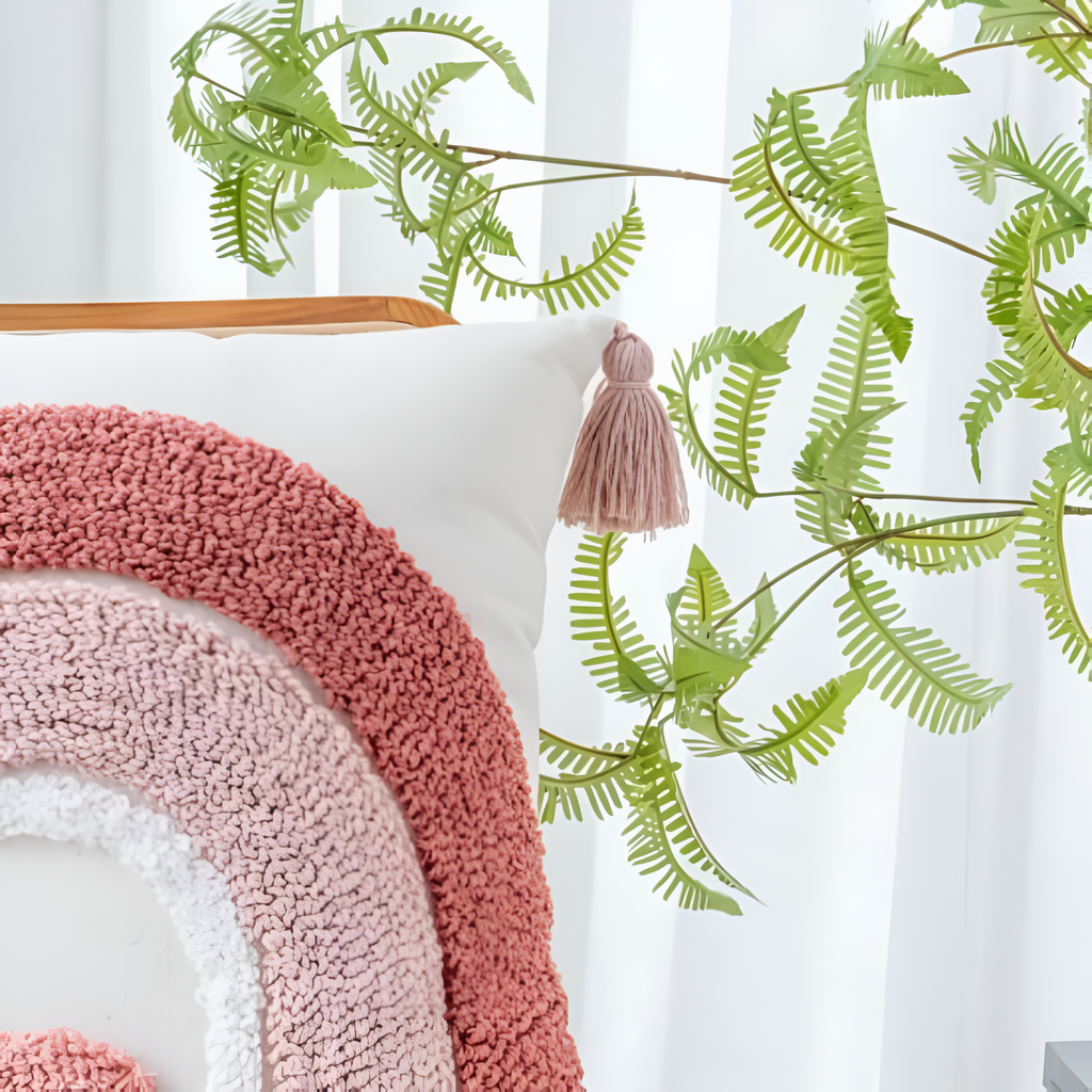 Housse de coussin boho brodée et touffetée