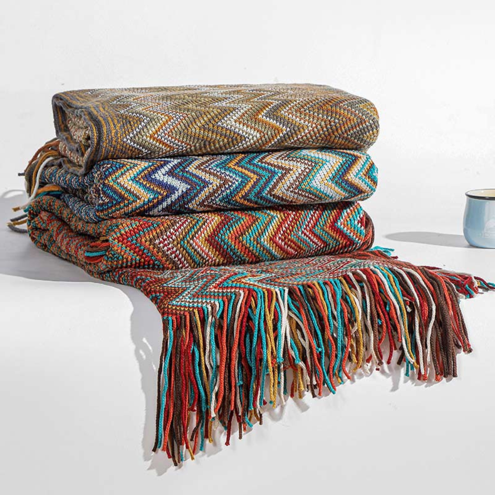 Plaid tricoté à pompons zigzag multicolore