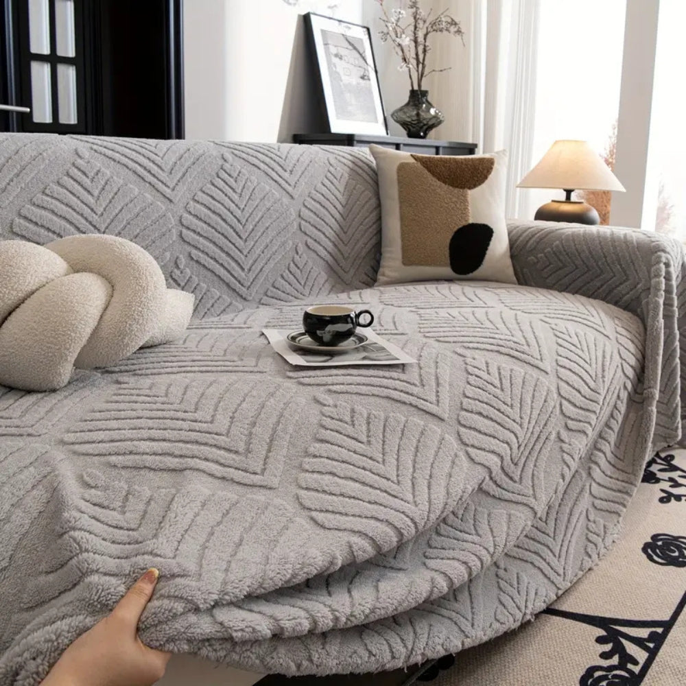 Housse de canapé en polaire motif feuilles chevrons