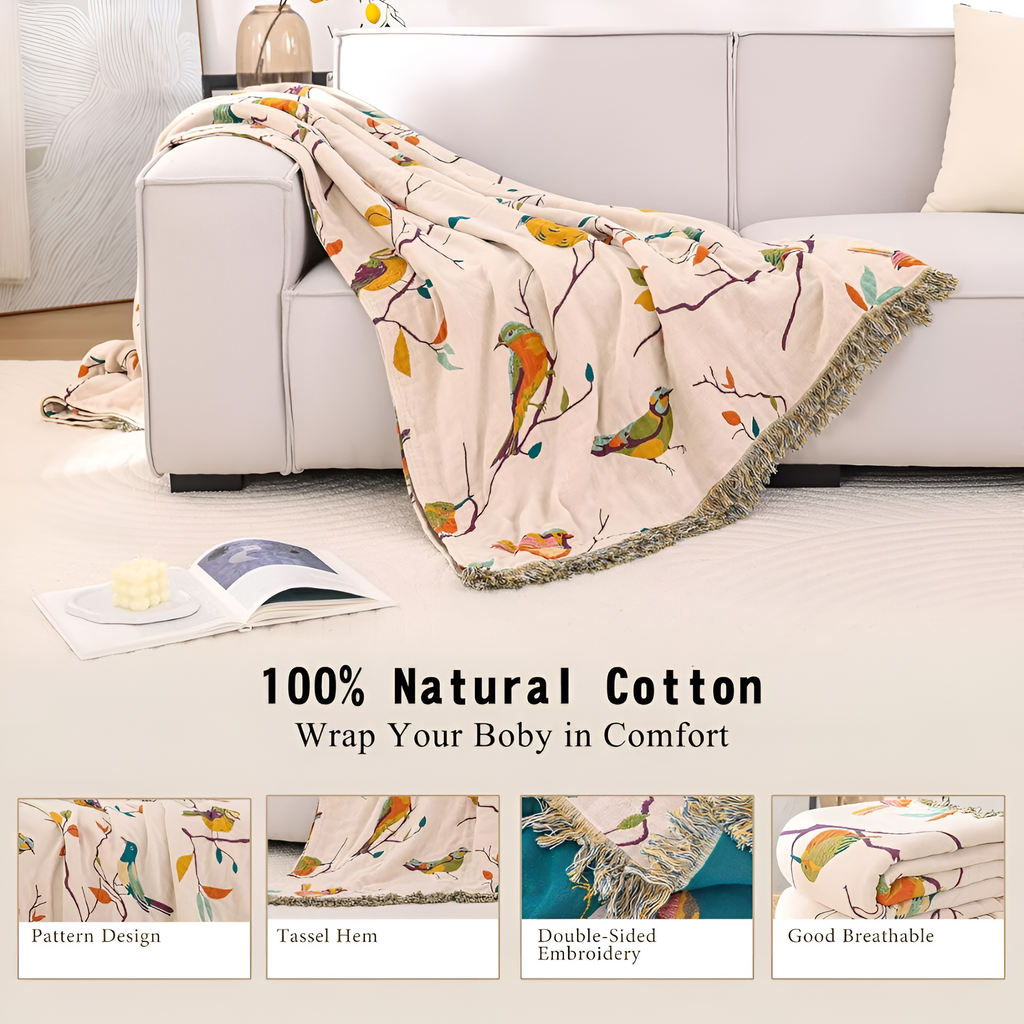 Plaid en coton à pompons motif oiseaux