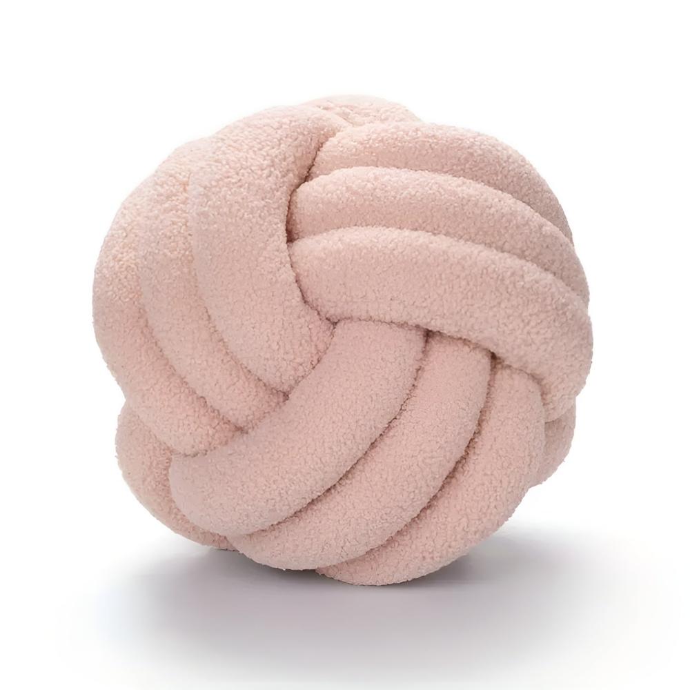 Coussin bouclette noué