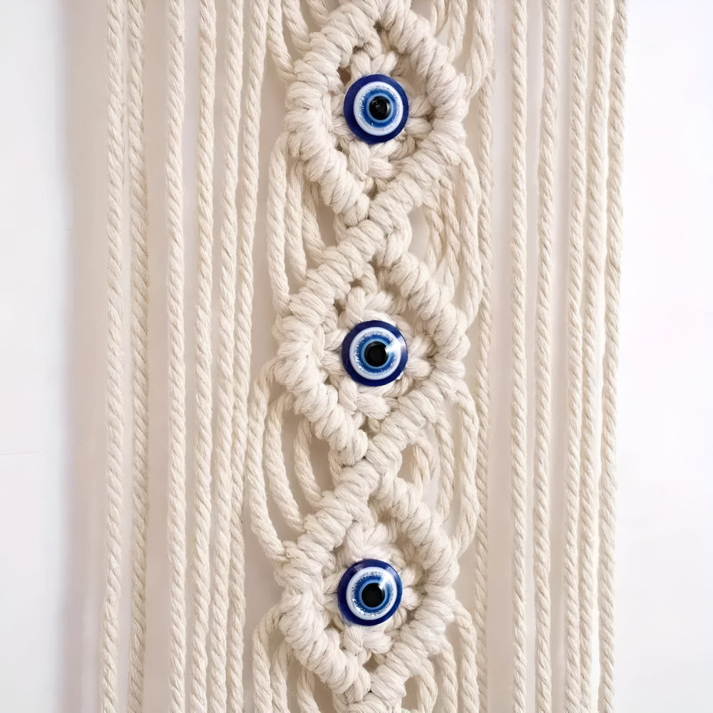 Décoration murale en macramé perles œil bohème