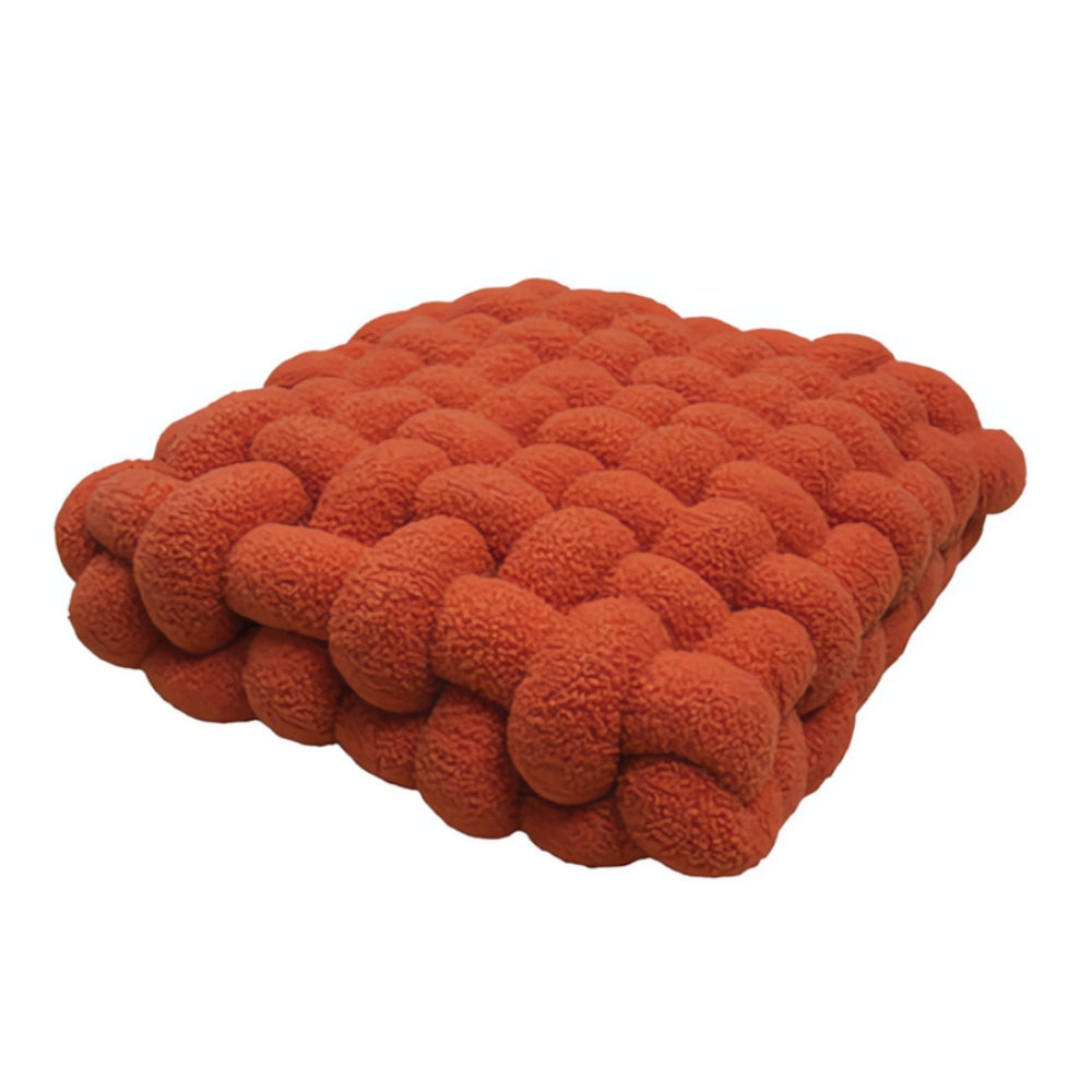 Coussin bouclette noué moelleux