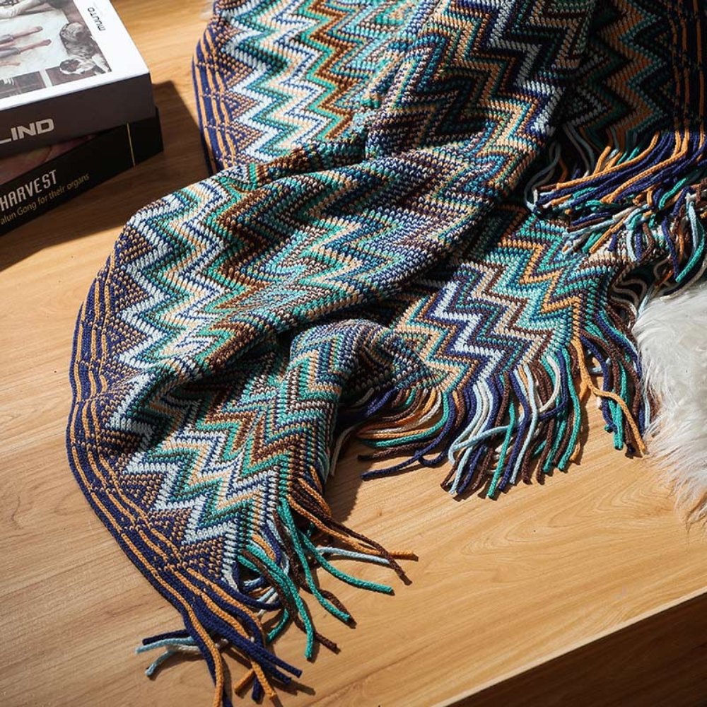 Plaid tricoté à pompons zigzag multicolore