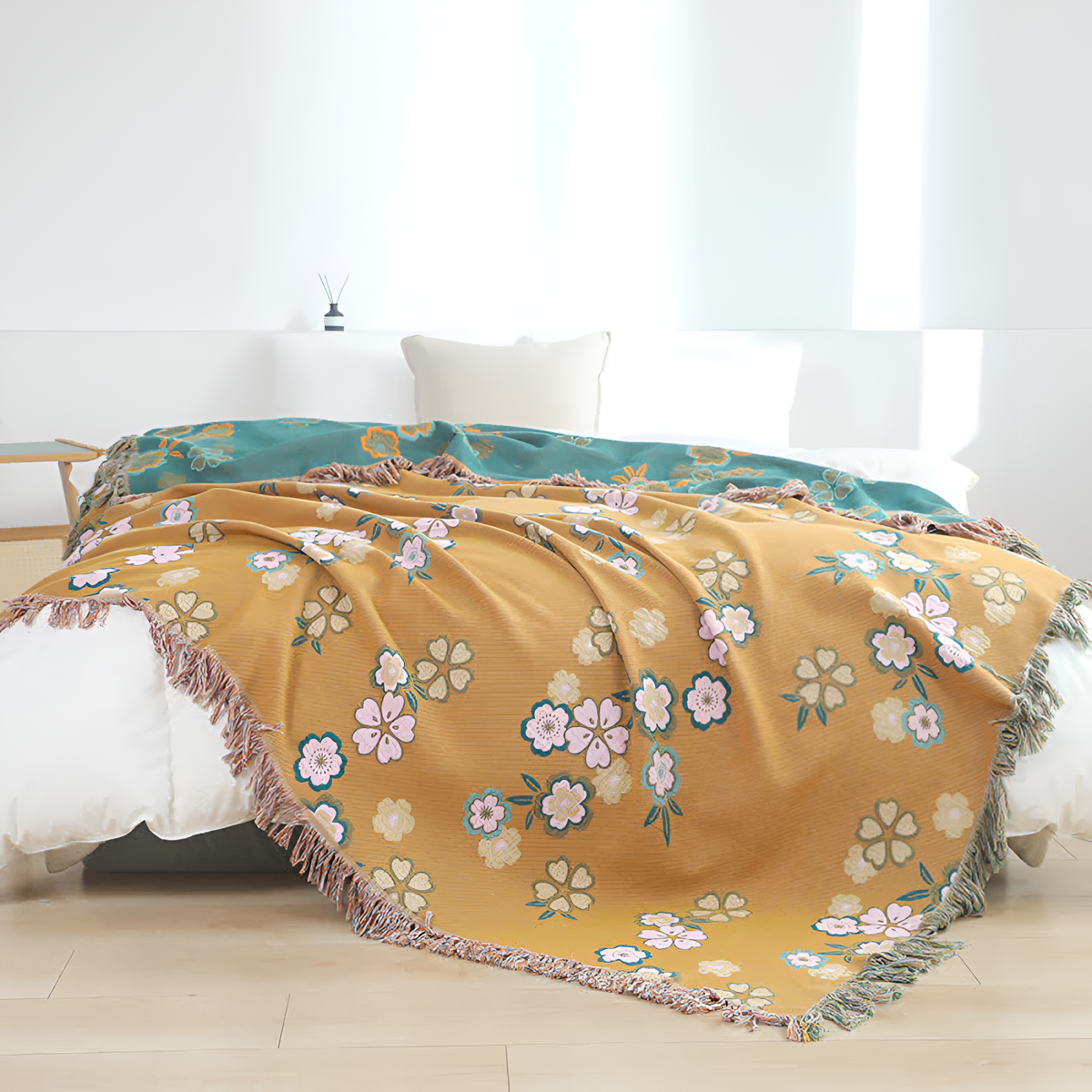 Plaid à pompons fleurs épanouies