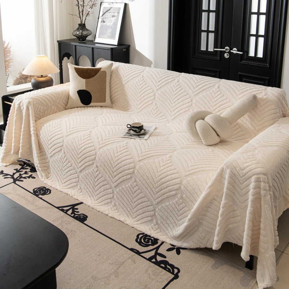 Housse de canapé en polaire motif feuilles chevrons