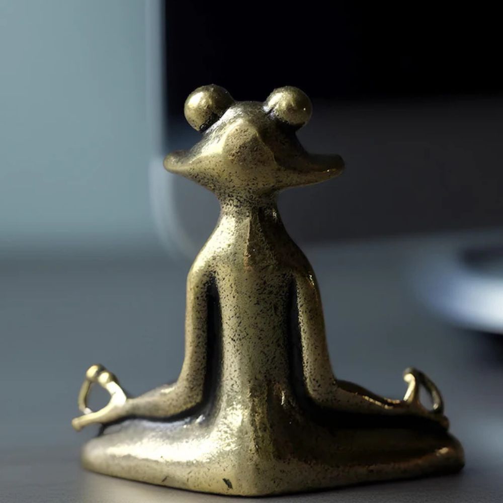 Figurine grenouille en position du lotus