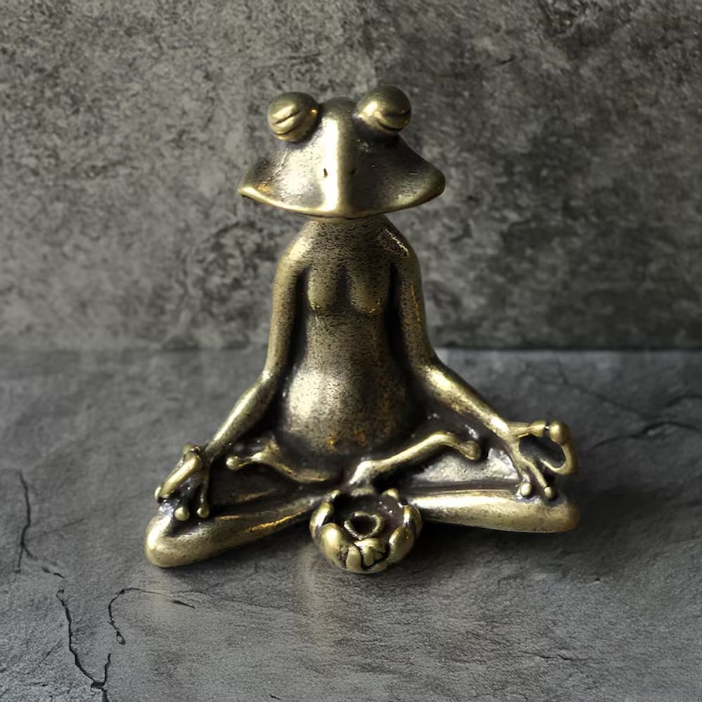 Figurine grenouille en position du lotus
