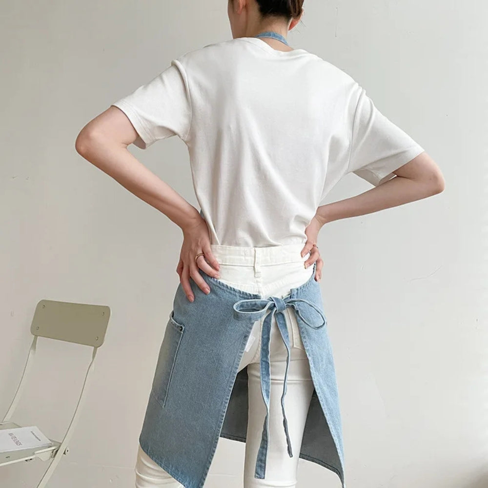 Tablier classique en denim bleu à poche