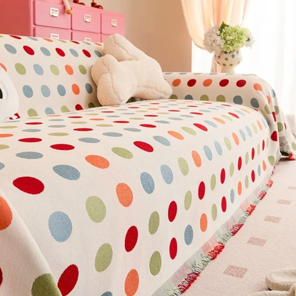 Housse de canapé colorée à pois