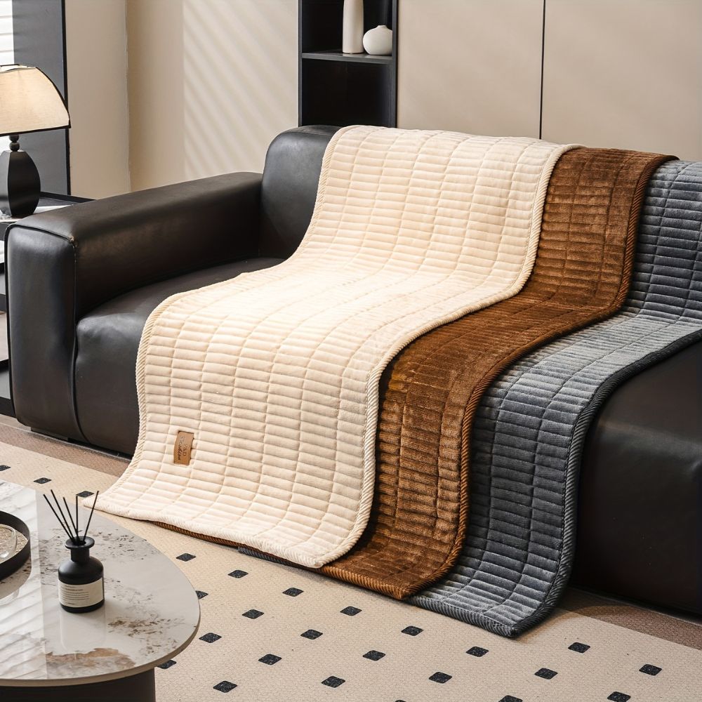 Housse de protection matelassée pour canapé