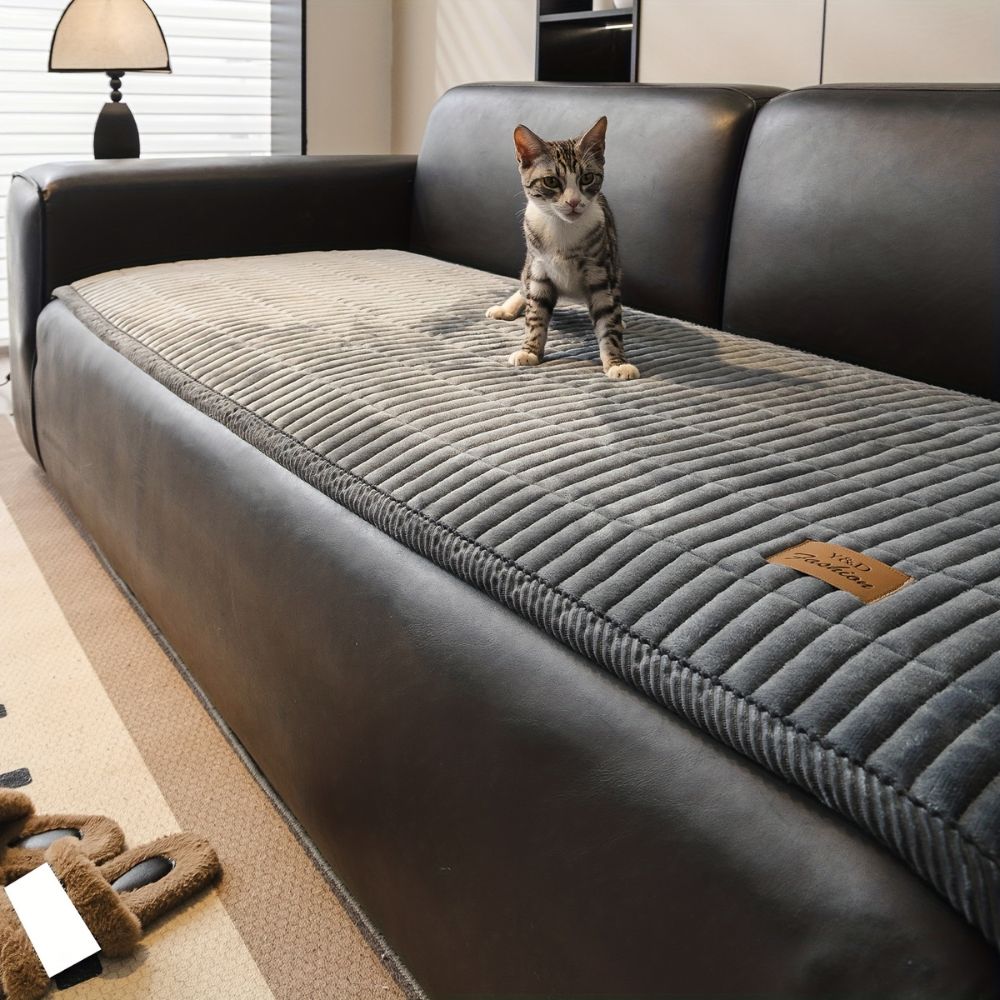 Housse de protection matelassée pour canapé