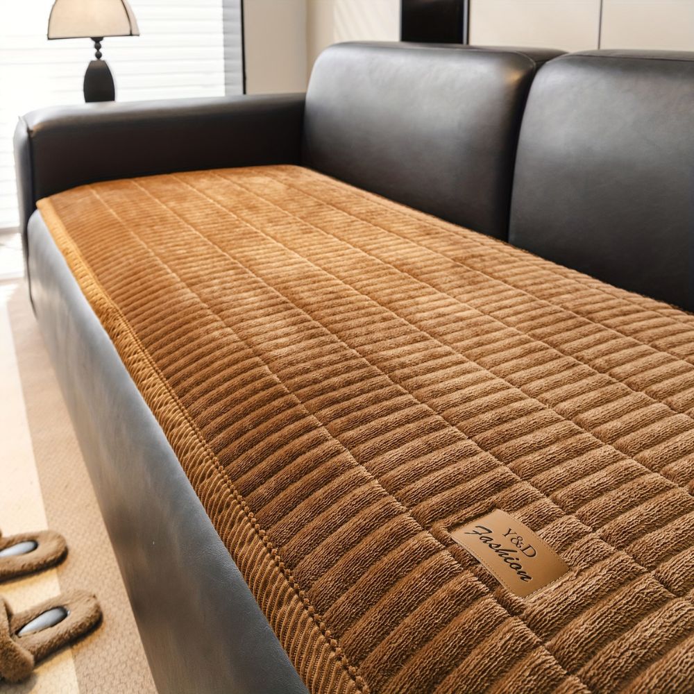 Housse de protection matelassée pour canapé