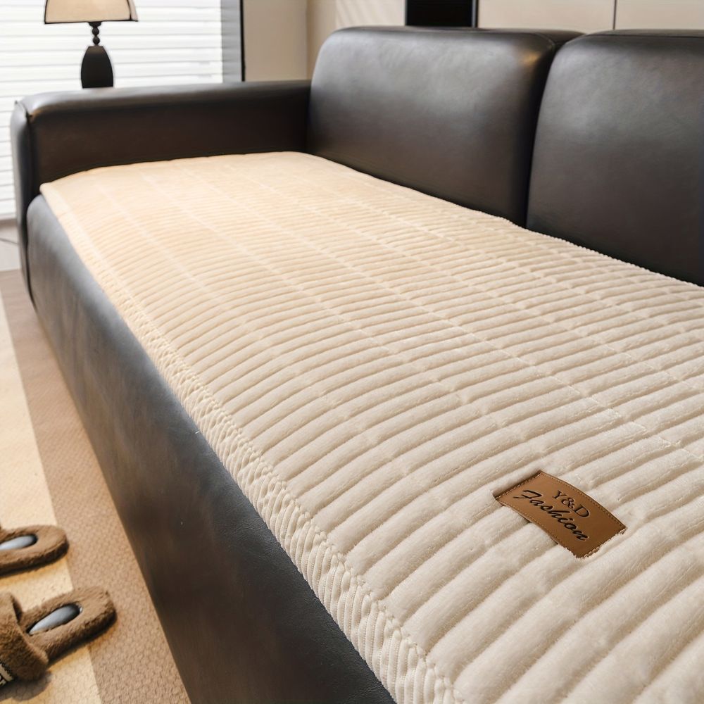 Housse de protection matelassée pour canapé