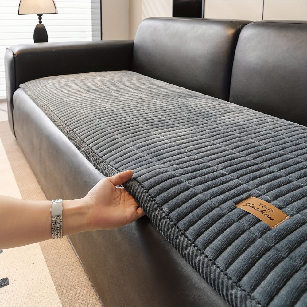 Housse de protection matelassée pour canapé