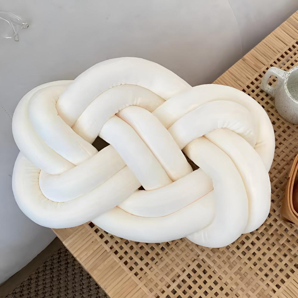 Coussin tressé moelleux