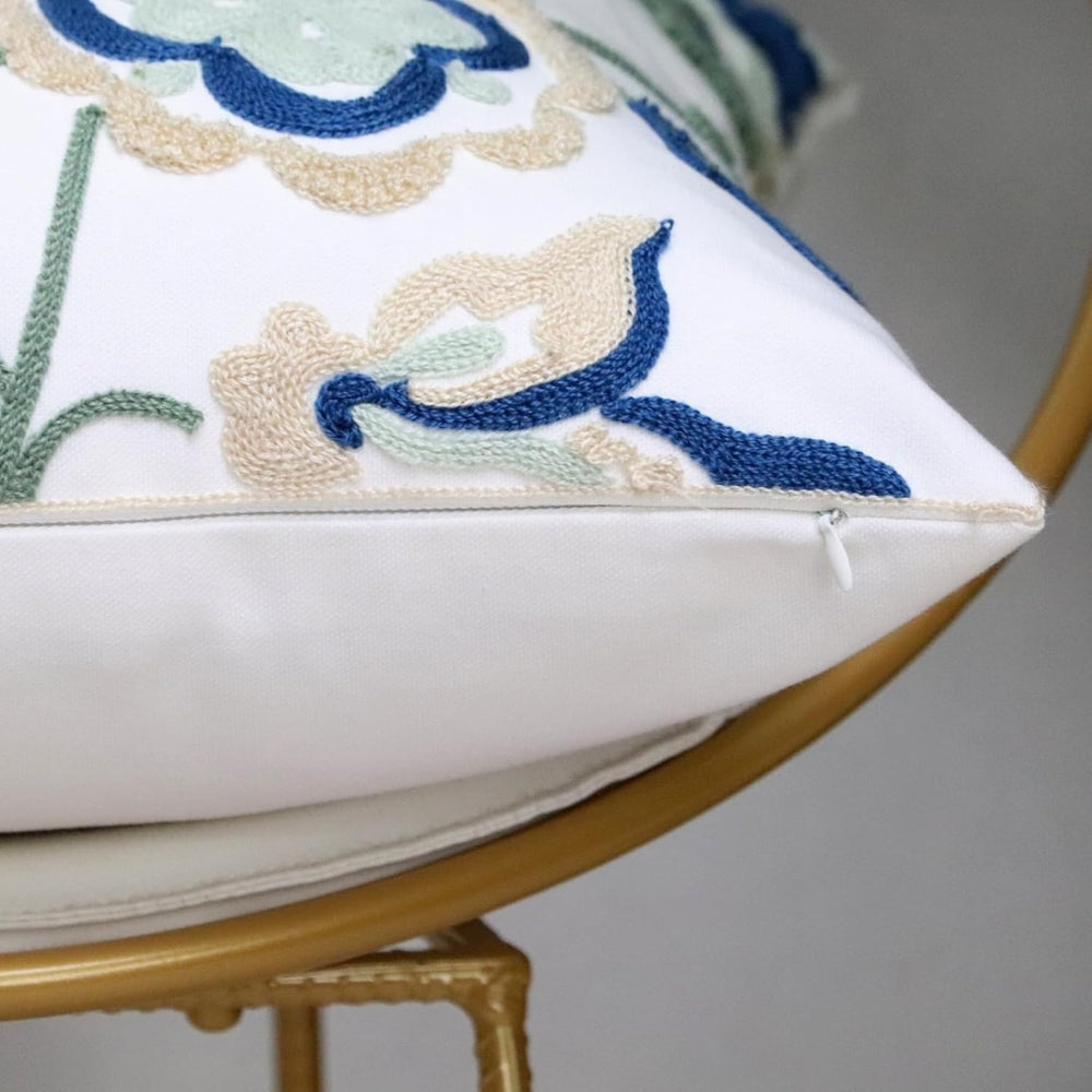 Housse de coussin touffetée fleurie Denza