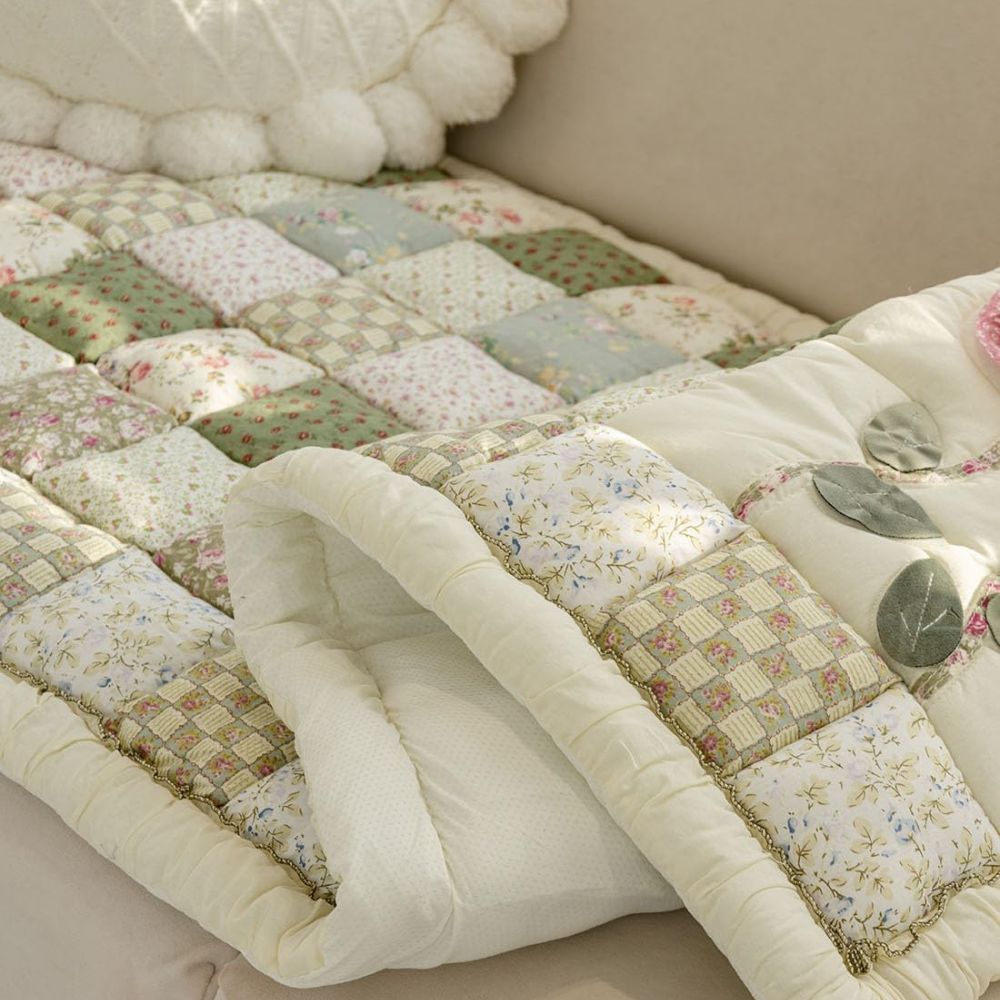 Housse de canapé matelassée fleurie