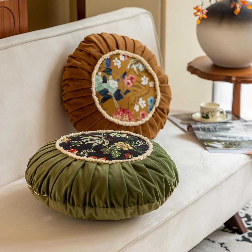 Coussin rond en velours bouquet fleuri