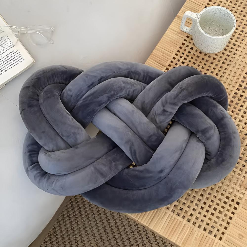 Coussin tressé moelleux
