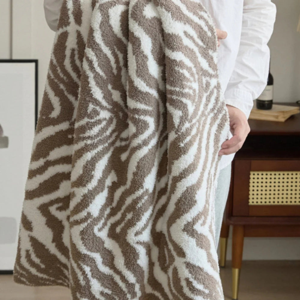 Plaid tricoté motif zèbre