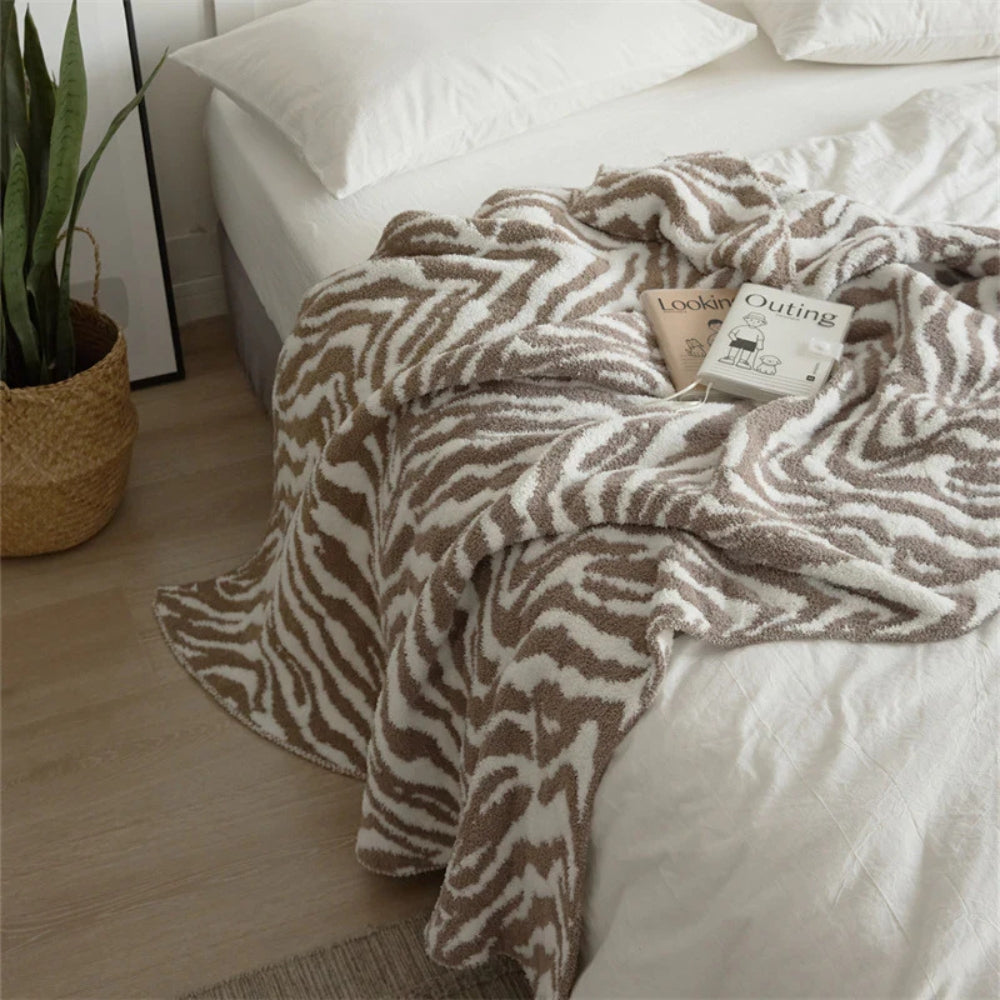Plaid tricoté motif zèbre