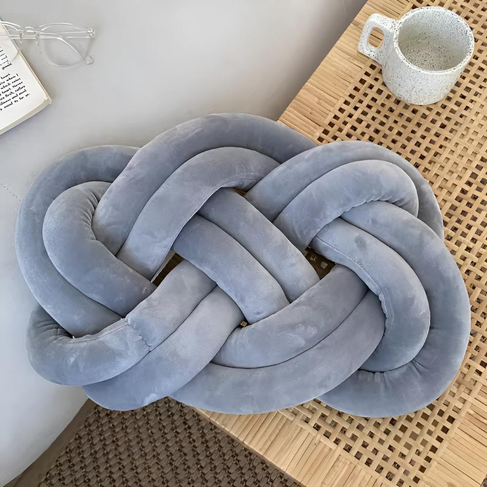 Coussin tressé moelleux