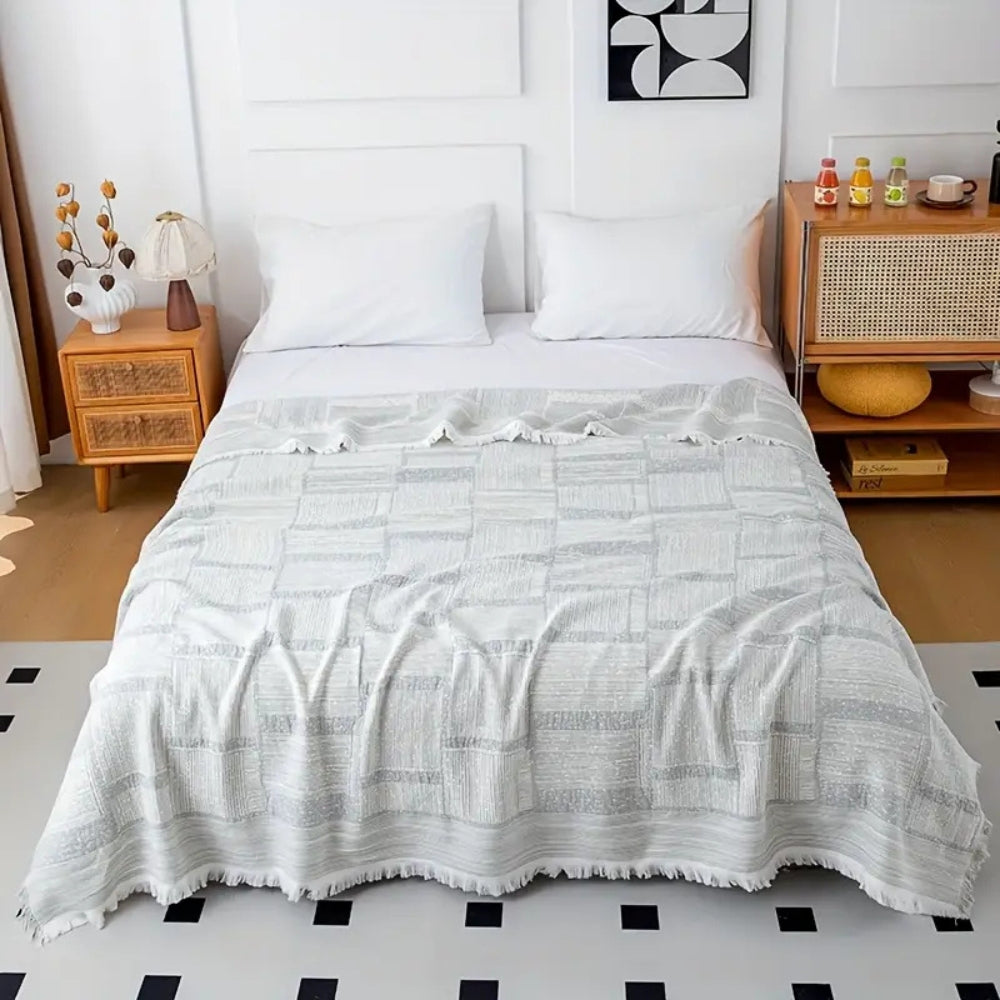 Plaid en coton géométrique tons mêlés